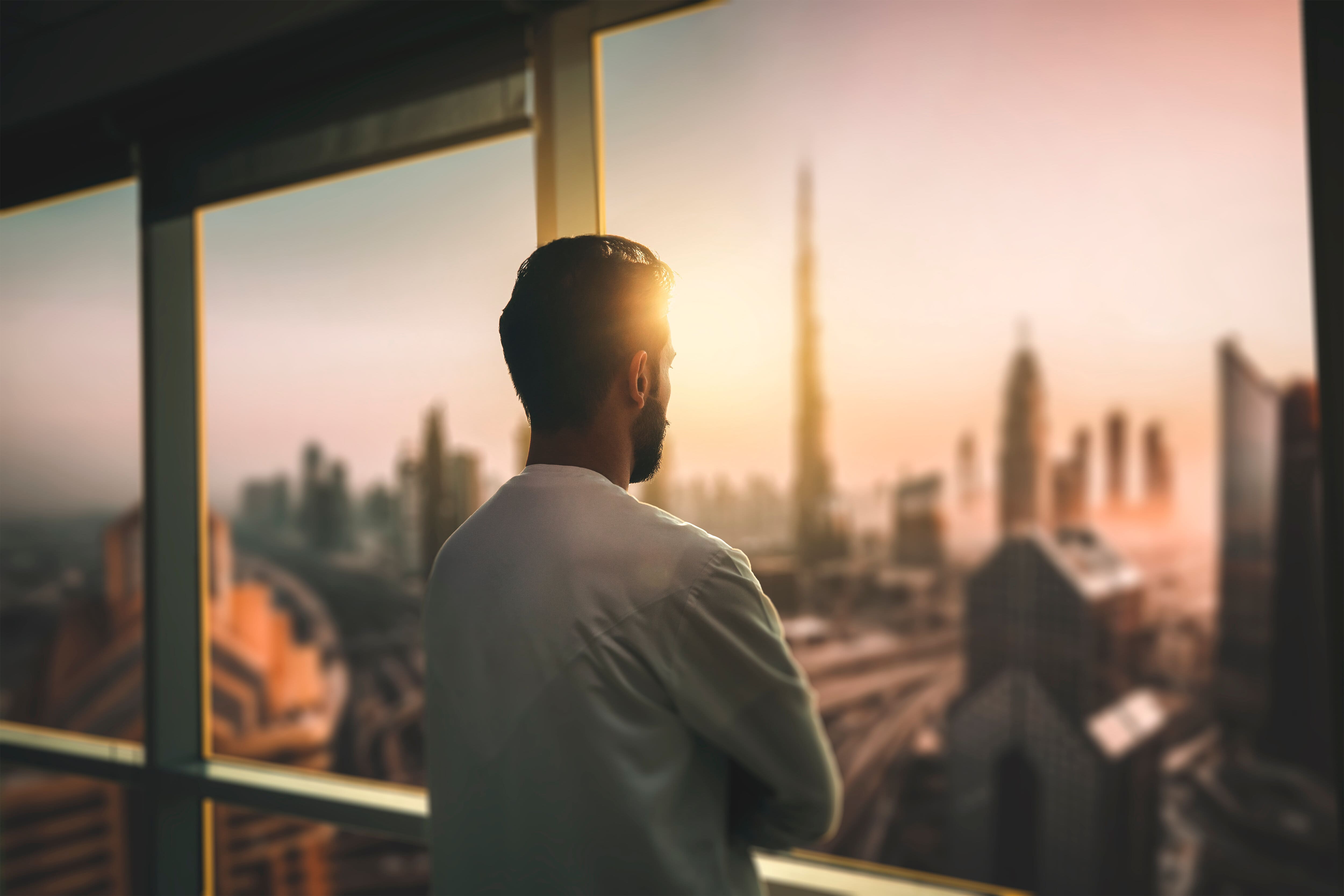 Arab man looking over Downtown Dubai