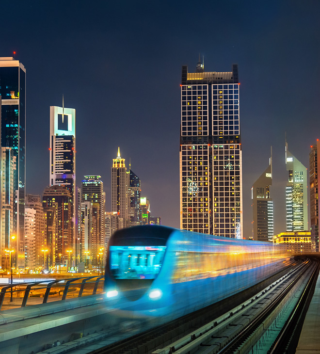 Dubai Metro with a skyline of Dubai
